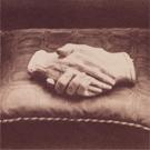 Clasped hands of Browning and his wife